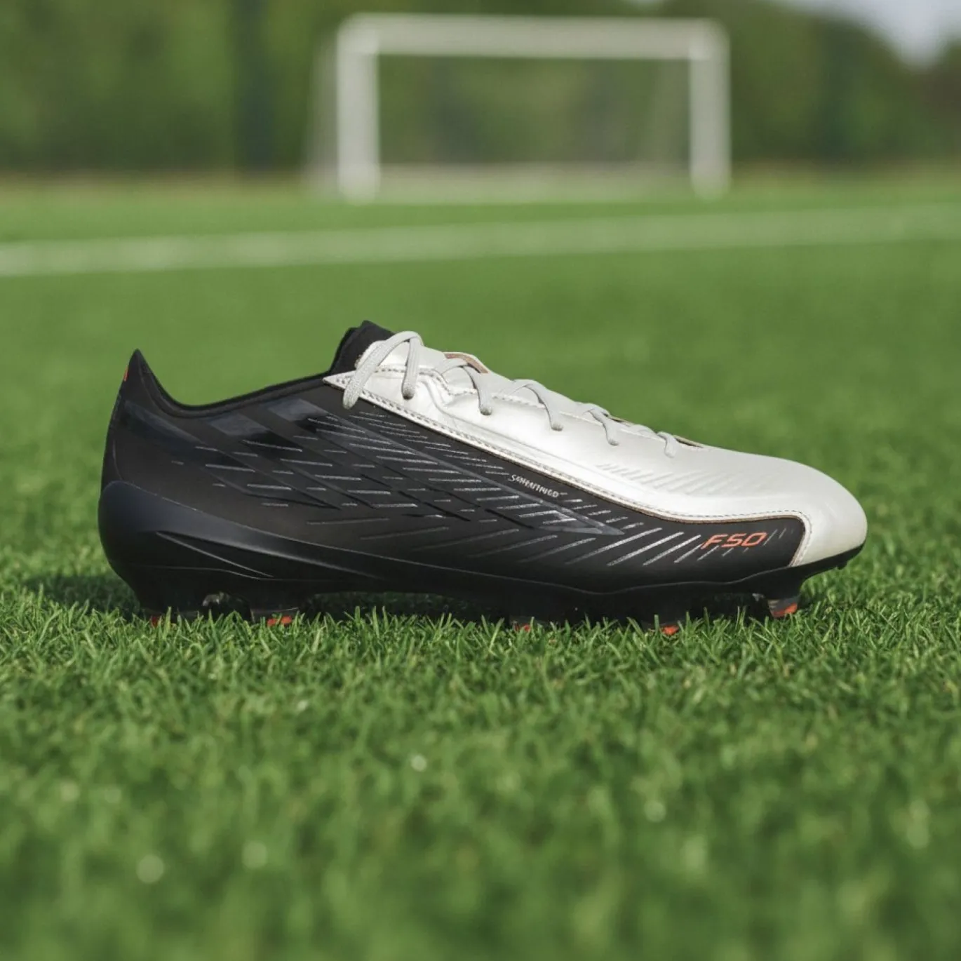 adidas F50 Hyperfast Elite L-Tech Gras Voetbalschoenen (FG) Zwart Wit Oranje