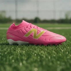 New Balance Tekela V5 Team Low Gras Voetbalschoenen (FG) Felroze Wit Goud