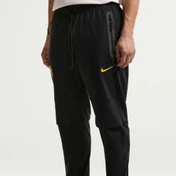 Nike Chelsea Tech Woven Trainingsbroek 2026-2027 Donkerblauw Goudgeel