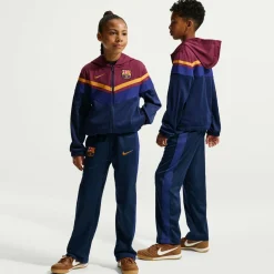 Nike FC Barcelona Sportswear Trainingspak 2026-2027 Kids Donkerblauw Rood Geeloranje
