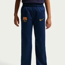 Nike FC Barcelona Sportswear Trainingspak 2026-2027 Kids Donkerblauw Rood Geeloranje