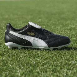 PUMA King Top Gras / Kunstgras Voetbalschoenen (MG) Zwart Goud Wit