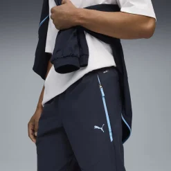 PUMA Manchester City Pumatech Trainingsbroek Woven 2025-2026 Donkerblauw Lichtblauw